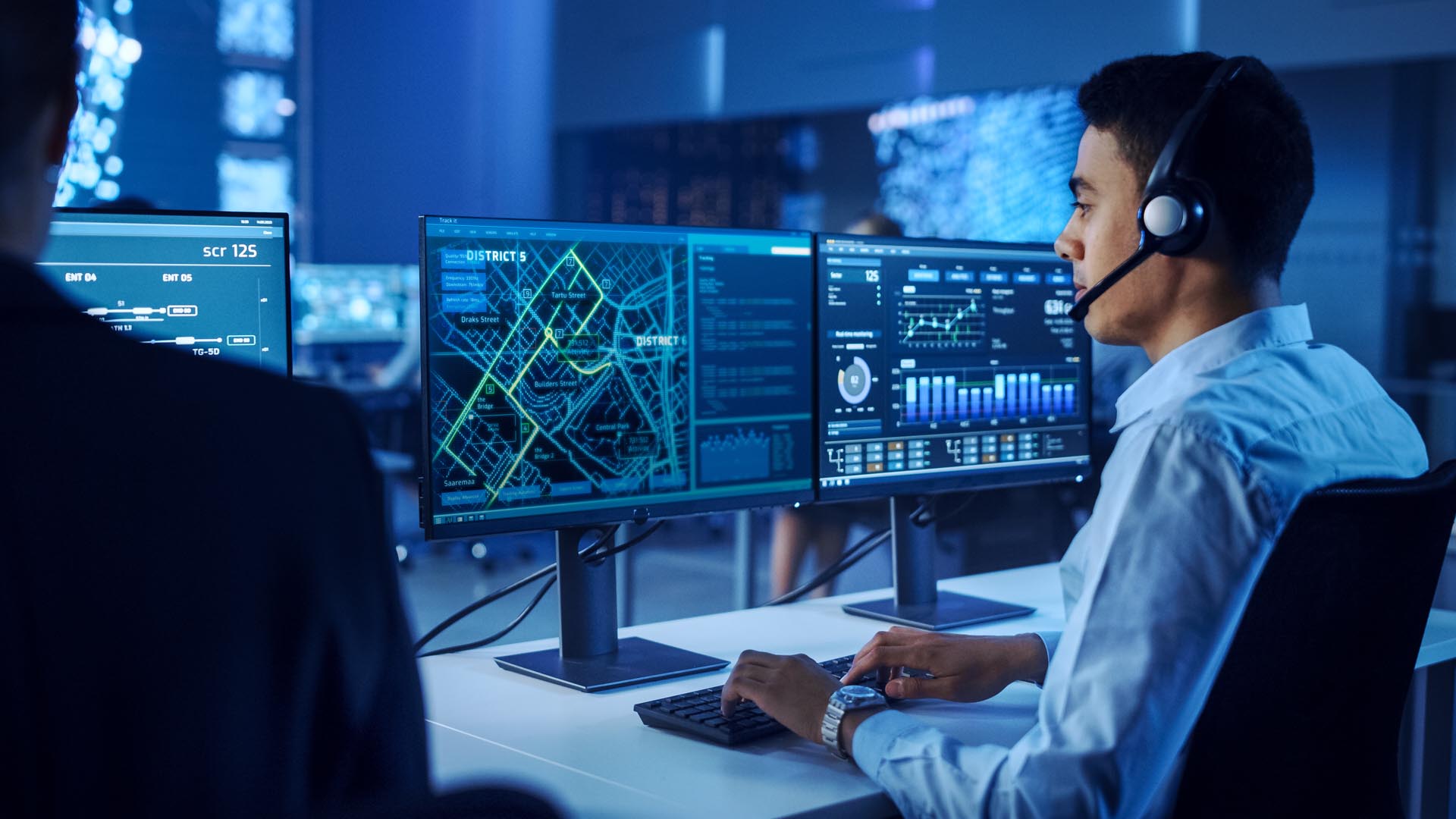 Confident Male Data Scientist Works on Personal Computer Wearing
